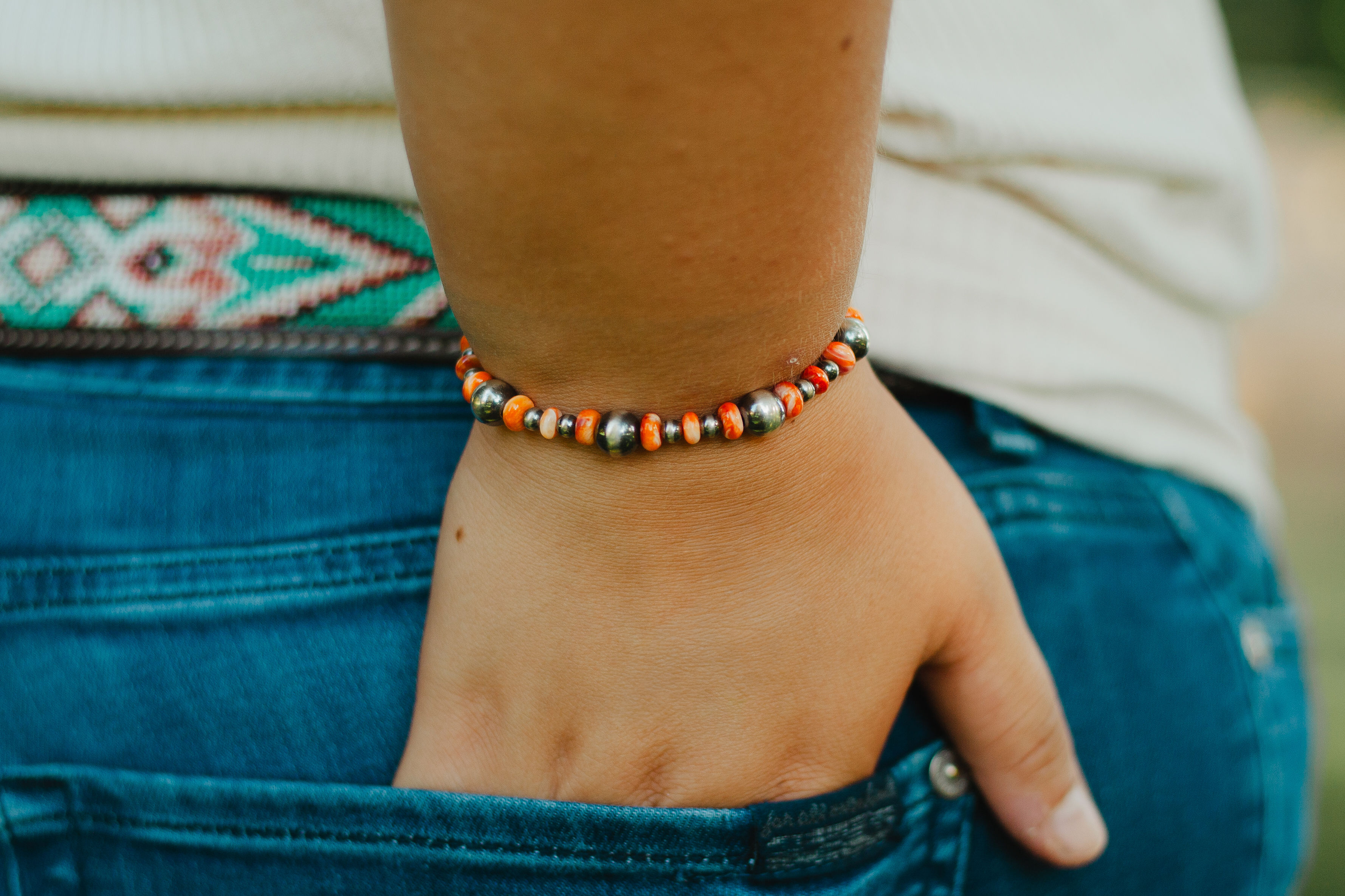 The Cowgirl orange spiny oyster and sterling silver bracelet