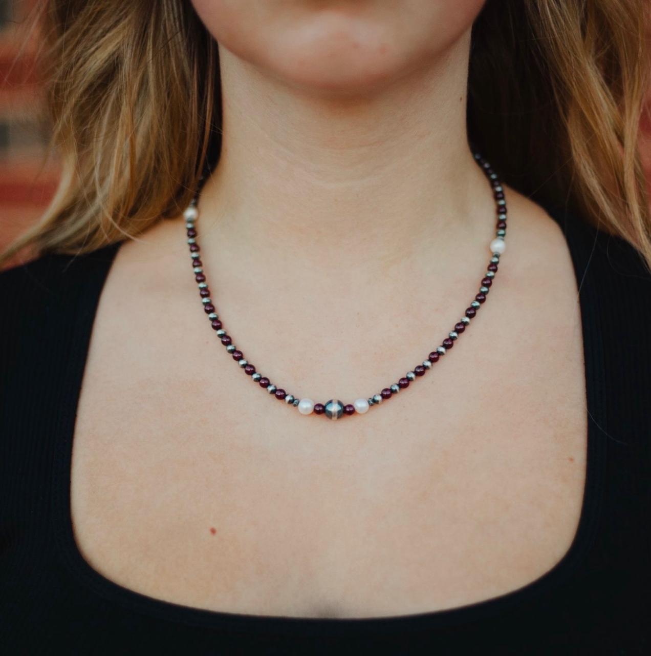 The Panther garnet, freshwater pearl, and sterling silver necklace